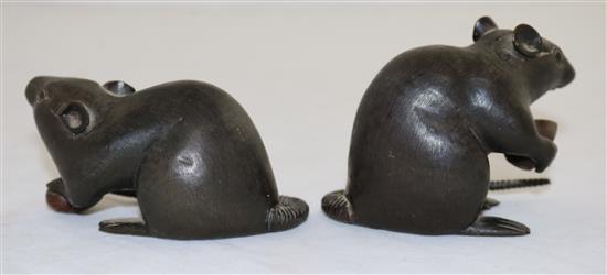 Two Japanese two-colour bronze models of a rat holding a nut, 19th century, length 9cm and 9.5cm